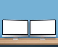 Место для работы с модель-макетом 2 компьютеров Стоковая Фотография RF Место для работы с модель-макетом 2 компьютеров Стоковая Фотография RF