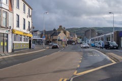 Мини-карусель Largs на главной улице с очень светлым движением стоковые изображения rf Мини-карусель Largs на главной улице с очень светлым движением стоковые изображения rf