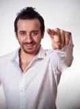 Молодой человек указывая палец к вам Стоковые Изображения RF Молодой человек указывая палец к вам Стоковые Изображения RF