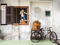 Настенная роспись искусства улицы в Джорджтауне, Penang, Малайзии стоковое фото Настенная роспись искусства улицы в Джорджтауне, Penang, Малайзии стоковое фото