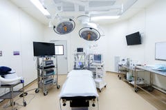 Оборудование и медицинские службы в современной операционной стоковая фотография Оборудование и медицинские службы в современной операционной стоковая фотография