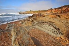 Pebble Beach на пляже положения полости фасоли в Калифорнии стоковая фотография rf Pebble Beach на пляже положения полости фасоли в Калифорнии стоковая фотография rf