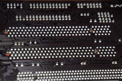 Обратная сторона microboard Припой контактов Припаянные части Электронная доска с электрическими деталями Стоковая Фотография RF Обратная сторона microboard Припой контактов Припаянные части Электронная доска с электрическими деталями Стоковая Фотография RF
