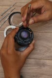 Объектив фотоаппарата починки, версия 6 стоковые изображения Объектив фотоаппарата починки, версия 6 стоковые изображения