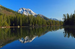 Озеро строк и держатель Moran, большой национальный парк Teton, Вайоминг стоковое фото rf Озеро строк и держатель Moran, большой национальный парк Teton, Вайоминг стоковое фото rf