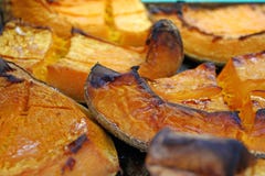 Органический кусок тыквы испеченный на праздник хеллоуина Красочная испеченная предпосылка сквоша Картина текстуры тыквы Pumpki з стоковые изображения rf Органический кусок тыквы испеченный на праздник хеллоуина Красочная испеченная предпосылка сквоша Картина текстуры тыквы Pumpki з стоковые изображения rf