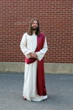 орденская лента робы человека jesus кирпича следующая, котор нужно огородить стоковое фото орденская лента робы человека jesus кирпича следующая, котор нужно огородить стоковое фото