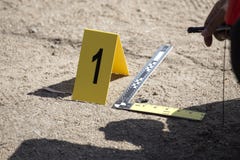 Отметка доказательства и масштаб правителя доказательства с enforcemen закона стоковые фото Отметка доказательства и масштаб правителя доказательства с enforcemen закона стоковые фото