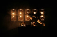 10 отработанных вентиляторов оснащенных через фоточувствительные датчики передают звук через свет во время выставки Issey Miyake Стоковое фото RF 10 отработанных вентиляторов оснащенных через фоточувствительные датчики передают звук через свет во время выставки Issey Miyake Стоковое фото RF