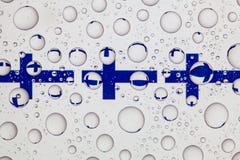 Падения воды на стекле и флаге Финляндии Стоковые Изображения RF Падения воды на стекле и флаге Финляндии Стоковые Изображения RF