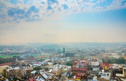 Панорама Львова, Украины старого города на восходе солнца стоковое фото rf Панорама Львова, Украины старого города на восходе солнца стоковое фото rf