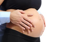 Пары касаясь животу беременной женщины стоковое фото Пары касаясь животу беременной женщины стоковое фото