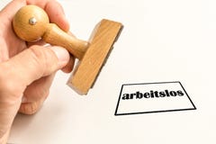 Печать на белой предпосылке о безработице с немецким словом для безработных стоковое фото rf Печать на белой предпосылке о безработице с немецким словом для безработных стоковое фото rf