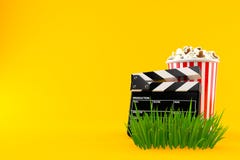 Попкорн и clapboard на траве бесплатная иллюстрация Попкорн и clapboard на траве бесплатная иллюстрация