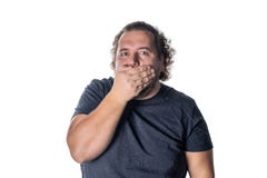 Портрет изумленного человека покрывая его рот над белой предпосылкой стоковые изображения Портрет изумленного человека покрывая его рот над белой предпосылкой стоковые изображения
