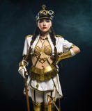 Портрет красивой девушки steampunk с идя ручкой и sa Стоковые Изображения Портрет красивой девушки steampunk с идя ручкой и sa Стоковые Изображения