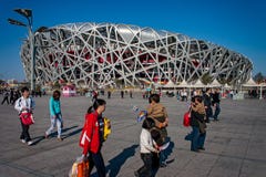 Птицы гнездятся стадион построенный для 2008 Олимпиад в Пекине, Китай стоковая фотография rf Птицы гнездятся стадион построенный для 2008 Олимпиад в Пекине, Китай стоковая фотография rf