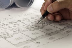 Рабочее место архитектора - крены и планы архитектора architrave стоковое изображение Рабочее место архитектора - крены и планы архитектора architrave стоковое изображение