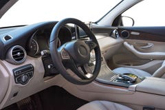 Салон автомобиля, дела класса на белой изолированной предпосылке стоковая фотография rf Салон автомобиля, дела класса на белой изолированной предпосылке стоковая фотография rf