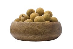 Свежий Longan в деревянной плите стоковая фотография Свежий Longan в деревянной плите стоковая фотография