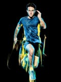Свет идущего jogger бегуна jogging изолированный человеком крася черную предпосылку стоковое фото rf Свет идущего jogger бегуна jogging изолированный человеком крася черную предпосылку стоковое фото rf