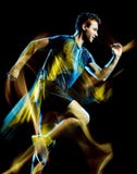 Свет идущего jogger бегуна jogging изолированный человеком крася черную предпосылку стоковая фотография Свет идущего jogger бегуна jogging изолированный человеком крася черную предпосылку стоковая фотография