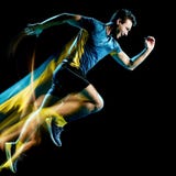 Свет идущего jogger бегуна jogging изолированный человеком крася черную предпосылку стоковое фото rf Свет идущего jogger бегуна jogging изолированный человеком крася черную предпосылку стоковое фото rf