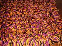 Связанное одеяло с poms pom стоковая фотография Связанное одеяло с poms pom стоковая фотография