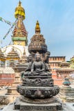4 сидя buddhas перед stupa Kaathe Swayambhu ShreeGha Chaitya стоковые изображения 4 сидя buddhas перед stupa Kaathe Swayambhu ShreeGha Chaitya стоковые изображения