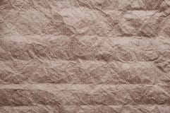 Скомканная бумага kraft Текстура скомкала повторно использованную старую коричневую бумагу стоковые изображения Скомканная бумага kraft Текстура скомкала повторно использованную старую коричневую бумагу стоковые изображения