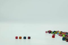 Слово & x22; love& x22; имеет это выразить чувства одного человека или много людей Письма помещены на белизне стоковое изображение rf Слово & x22; love& x22; имеет это выразить чувства одного человека или много людей Письма помещены на белизне стоковое изображение rf