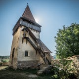 Средневековая башня церковь-крепости Biertan в лете стоковые фото Средневековая башня церковь-крепости Biertan в лете стоковые фото