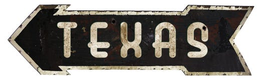 Стрелка Техаса Roadsign стоковое изображение rf Стрелка Техаса Roadsign стоковое изображение rf