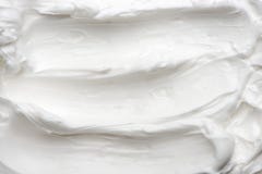 Текстура cream конца-вверх cream белизна косметической белизна изолированная сливк custard стоковые фото Текстура cream конца-вверх cream белизна косметической белизна изолированная сливк custard стоковые фото