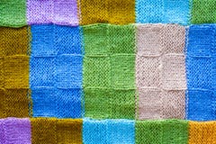 Текстура пестротканых частей связанной крышки, предпосылки красочных потоков стоковые фото Текстура пестротканых частей связанной крышки, предпосылки красочных потоков стоковые фото