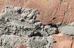 Текстура старой кирпичной стены со случайно прикладным бетоном стоковые фотографии rf Текстура старой кирпичной стены со случайно прикладным бетоном стоковые фотографии rf
