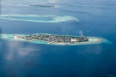 Тропические острова и атоллы в Мальдивах стоковое изображение rf Тропические острова и атоллы в Мальдивах стоковое изображение rf