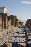 Улица Помпеи с камнями стоковое фото rf Улица Помпеи с камнями стоковое фото rf