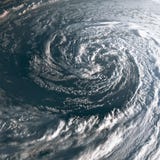 Ураган на земле осмотренной от космоса Тайфун над землей планеты Ураган на земле осмотренной от космоса Тайфун над землей планеты