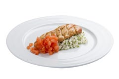 Филе цыпленка в сладком и кислом соусе с рисом и овощами стоковые фото Филе цыпленка в сладком и кислом соусе с рисом и овощами стоковые фото