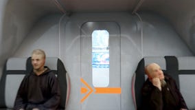 Футуристическая шина летая над городом, городок пассажира Архитектура будущего вид с воздуха Супер реалистическое 4k бесплатная иллюстрация Футуристическая шина летая над городом, городок пассажира Архитектура будущего вид с воздуха Супер реалистическое 4k бесплатная иллюстрация