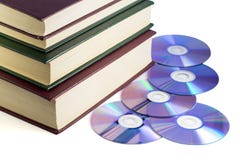 Хранители информации - книги и диски компьютера стоковая фотография Хранители информации - книги и диски компьютера стоковая фотография