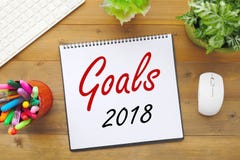 2018 целей на бумажной предпосылке блокнота на таблице офиса, busine Стоковые Фото 2018 целей на бумажной предпосылке блокнота на таблице офиса, busine Стоковые Фото