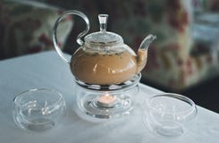 Чай Masala в прозрачном чайнике стоковое изображение Чай Masala в прозрачном чайнике стоковое изображение