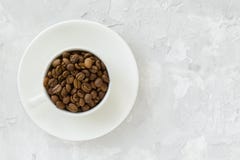 Чашка с кофейными зернами Стоковое Фото Чашка с кофейными зернами Стоковое Фото