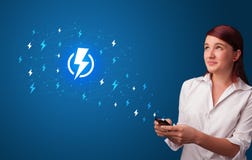 Человек используя телефон с концепцией силы стоковые фото Человек используя телефон с концепцией силы стоковые фото
