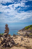 Экзотический пейзаж камня моря захода солнца стоковые изображения rf Экзотический пейзаж камня моря захода солнца стоковые изображения rf