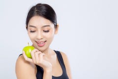 微笑画象亚裔的妇女举行绿色苹果果子和美好的身体饮食与在白色背景隔绝的适合,女孩重量 库存图片 微笑画象亚裔的妇女举行绿色苹果果子和美好的身体饮食与在白色背景隔绝的适合,女孩重量 库存图片