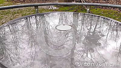 在操场上的柔滑的波在大雨后jolly转台式的森林是圆的环岛或陀螺好的反映影视素材 视频包括有冥想 茄子 在操场上的柔滑的波在大雨后jolly转台式的森林是圆的环岛或陀螺好的反映影视素材 视频包括有冥想 茄子