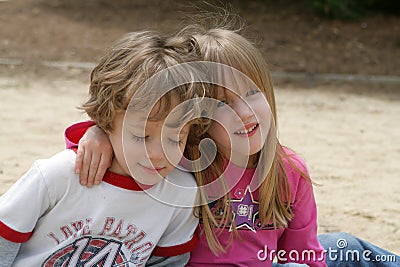 2 kids in the sandbox Stock Photo